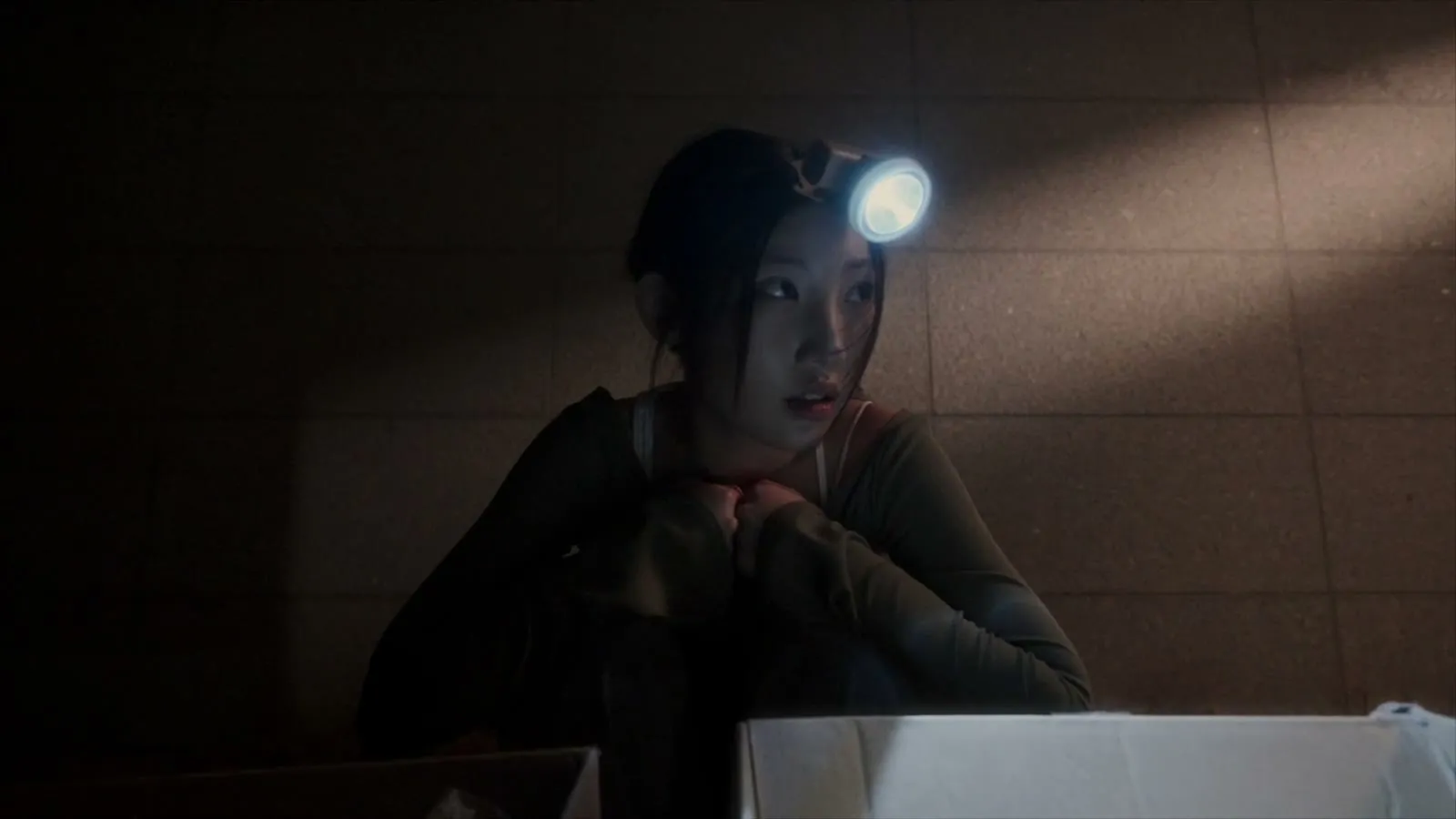 Peeling labels in the dark under a single head torch