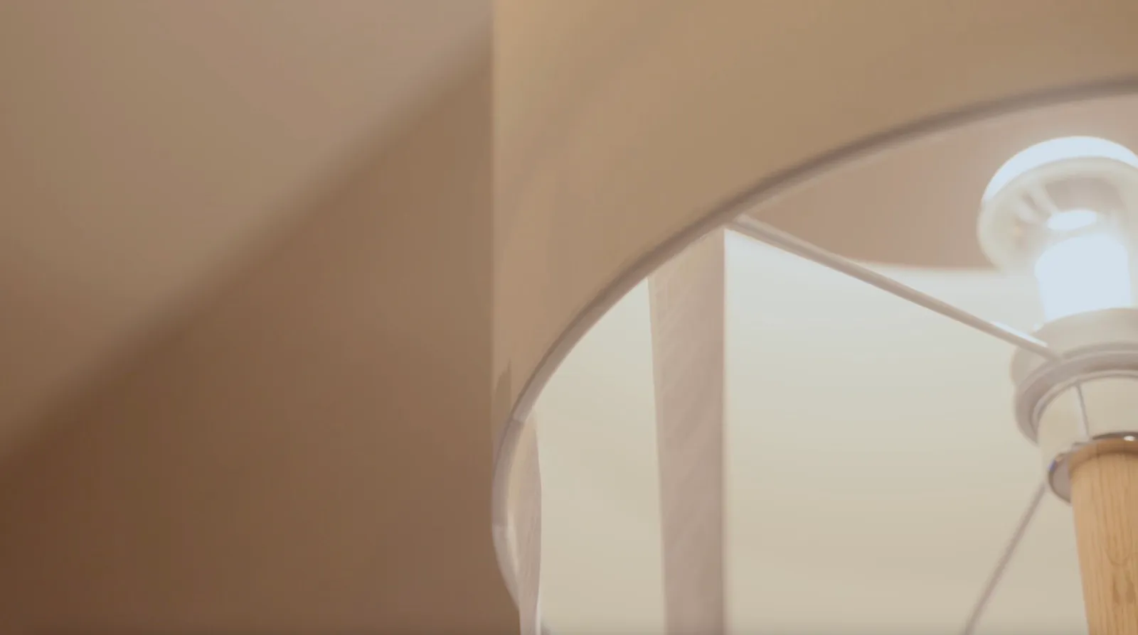 A receipt spooling out from inside a lampshade